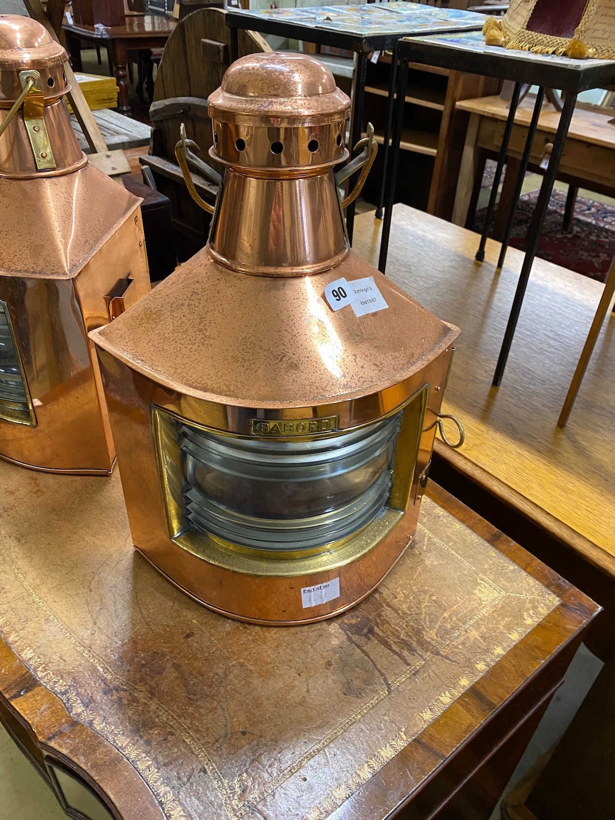 A pair of copper and brass ship's lanterns, height 51cm